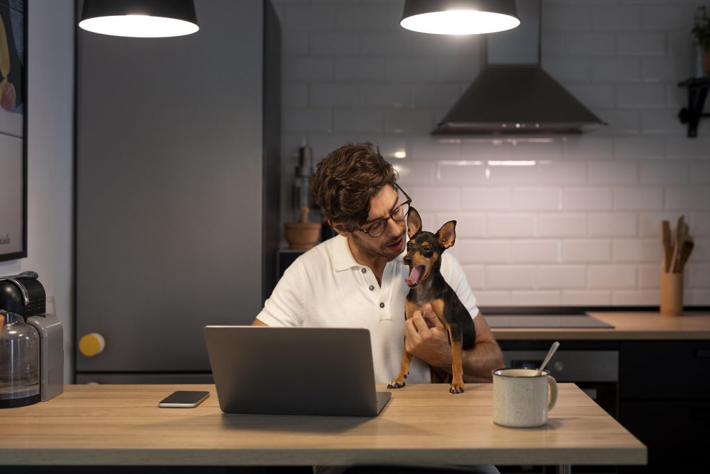 Person working from home with pet dog