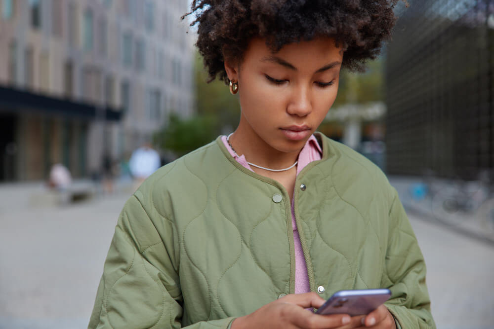 Young woman using mobile phone
